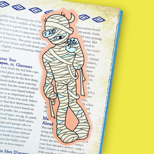 A vintage illustrated book page featuring a cartoon character wrapped in bandages, with text columns on both sides and a bright yellow background visible at the edges.