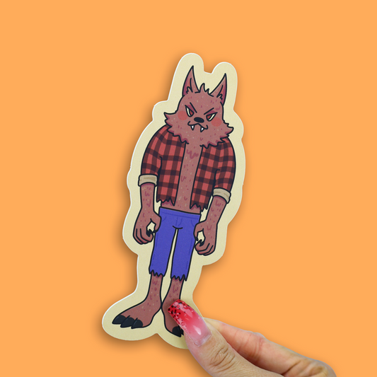 A die-cut sticker featuring a cartoon angry werewolf wearing a red and black plaid shirt and blue pants, held by a hand with pink glittery nail polish against a solid orange background.