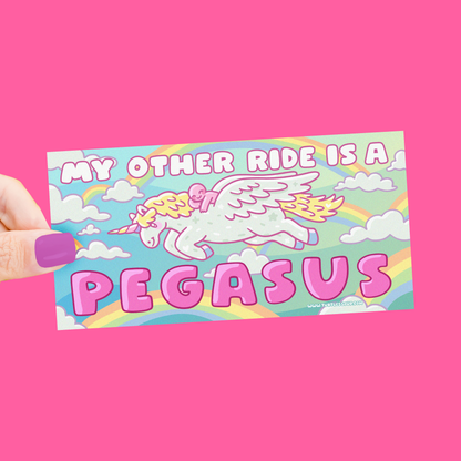 Sticker with a pegasus design and text on a pink background