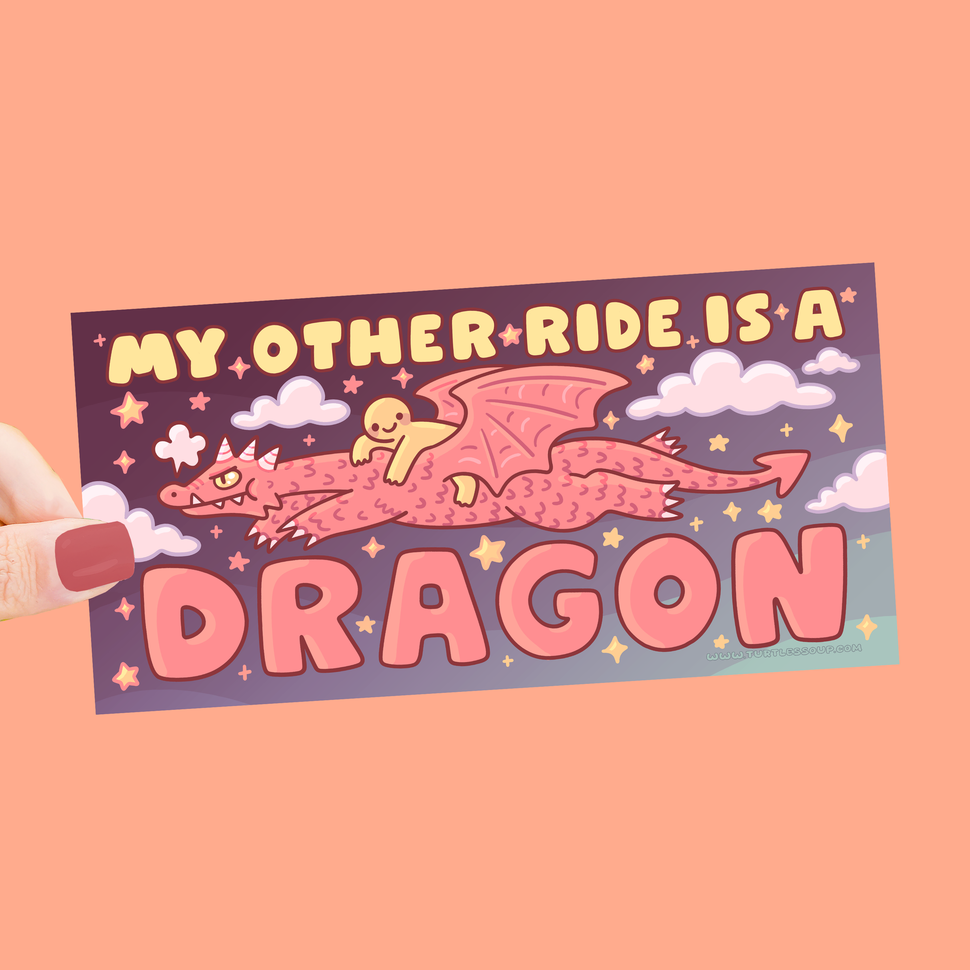 Sticker with a dragon design and text on a pink background