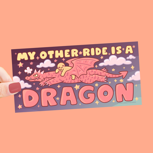 Sticker with a dragon design and text on a pink background