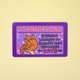A rectangular novelty card or sticker with a purple border and a cartoon orange cat, reading 'CAT HANDLER LICENSE' and 'Official License to Handle and Wrangle CATS,' shown on a pale yellow background.