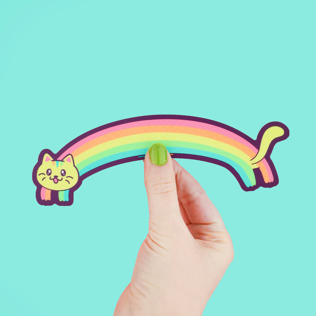 Sticker shaped like a cat that has a long colorful rainbow for its body
