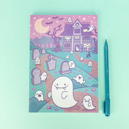 photo of a notebook cover featuring a ghost graveyard