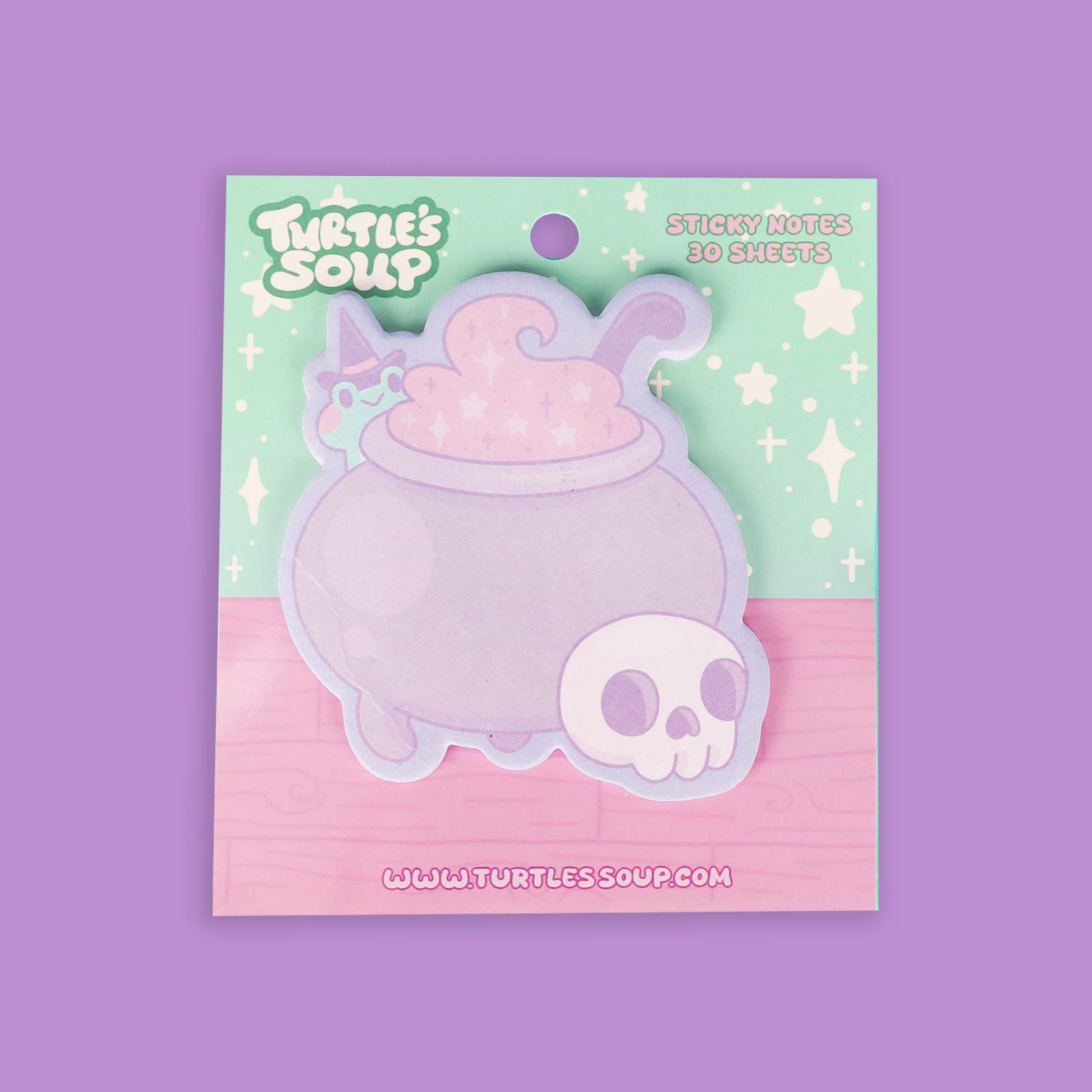 A package of 'Turtle's Soup' brand sticky notes featuring a cute pastel purple cauldron with pink potion and a small white skull, presented on a mint and pink backing card against a solid purple background.