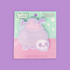 A package of 'Turtle's Soup' brand sticky notes featuring a cute pastel purple cauldron with pink potion and a small white skull, presented on a mint and pink backing card against a solid purple background.