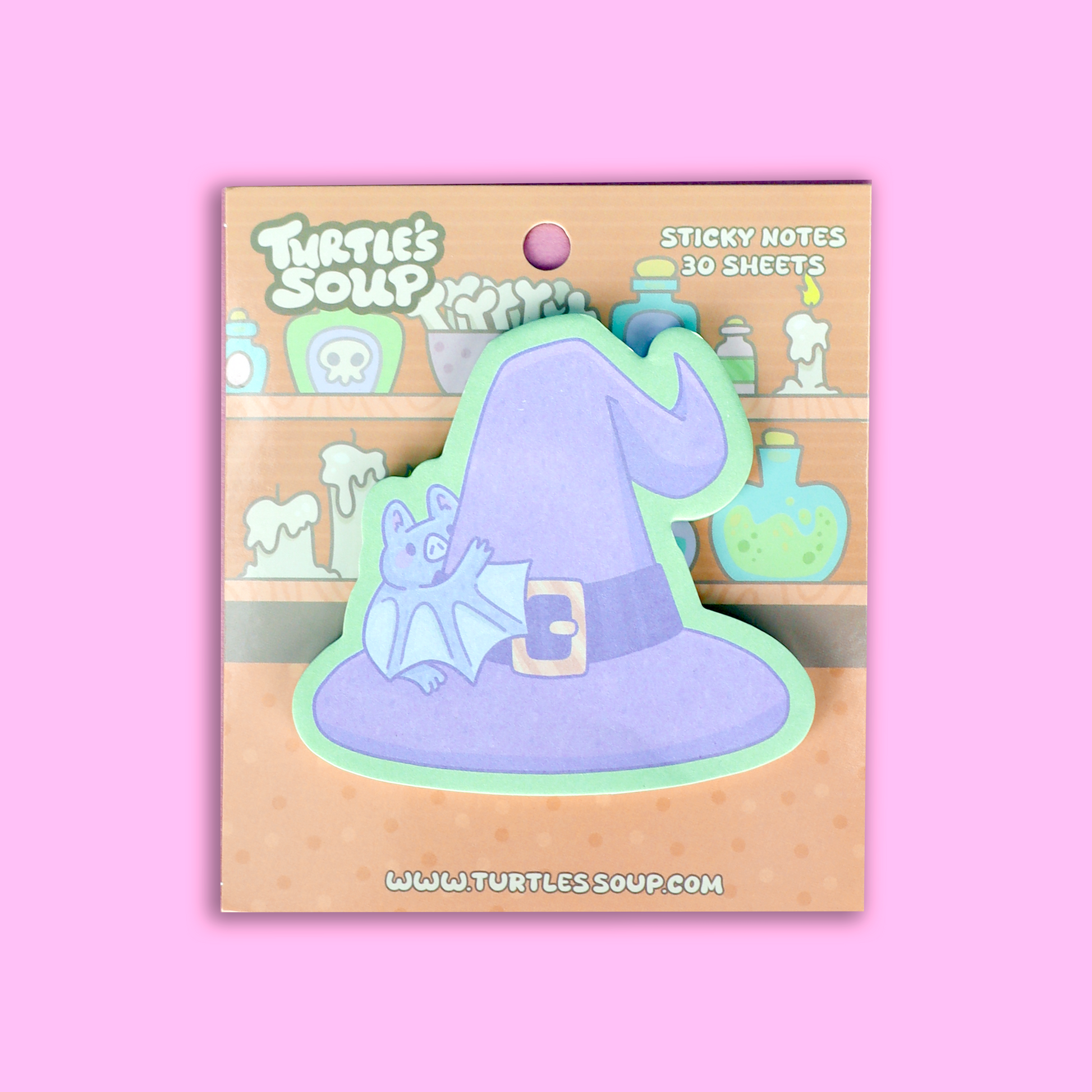 A package of Turtle's Soup brand sticky notes on a solid pink background. The product features a cute illustration of a small blue bat perched on a purple witch hat with a mint green border.