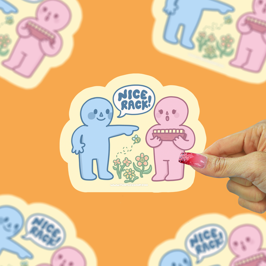 Nice rack mahjong sticker being held against a orange background
