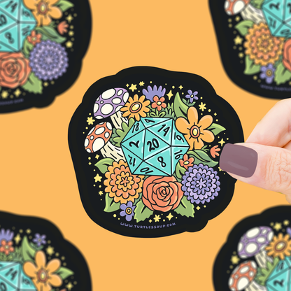 Decorative sticker with a D20 die surrounded by flowers on a yellow background