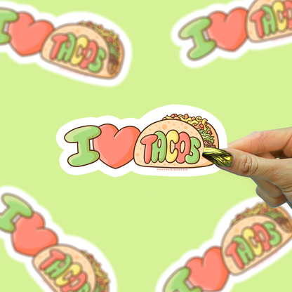 Sticker with 'I ❤️ TACOS' text on a green background