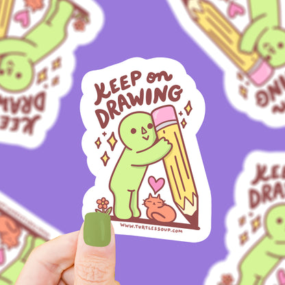 keep on drawing cute little dude holding pencil artist sticker