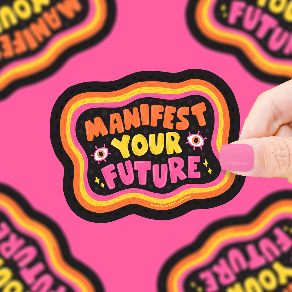 Black, orange, yellow, and pink sticker in wavy designs with text "manifest your future"
