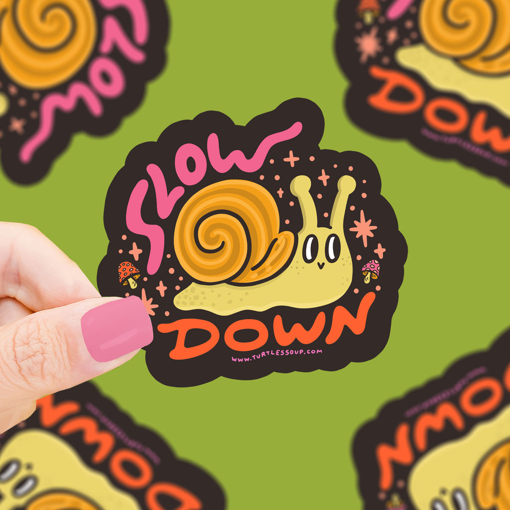 A happy snail with the text "slow down"