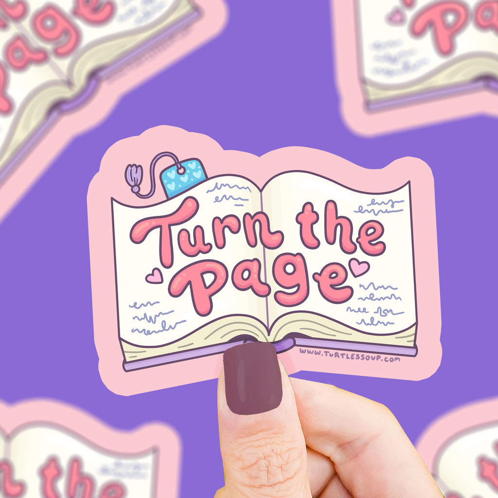 Open book with text on the pages that says "turn the page"