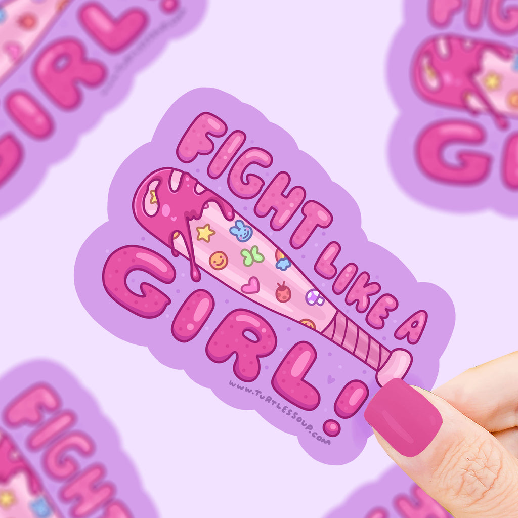 Text that says "fight like a girl" with a bat covered in cute stickers and dripping pink blood
