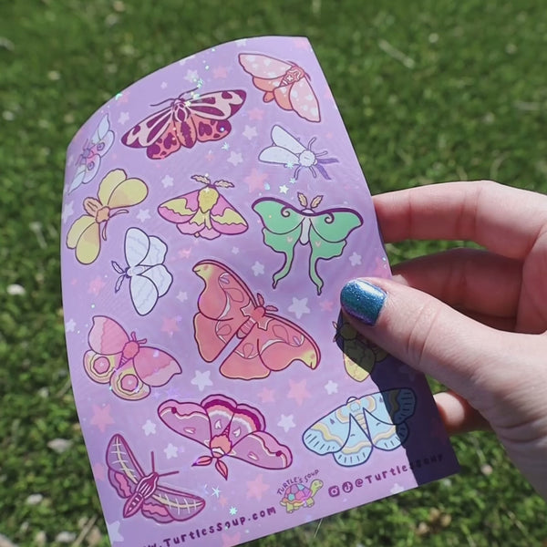 video of our moth glitter sheet shining in the sunlight